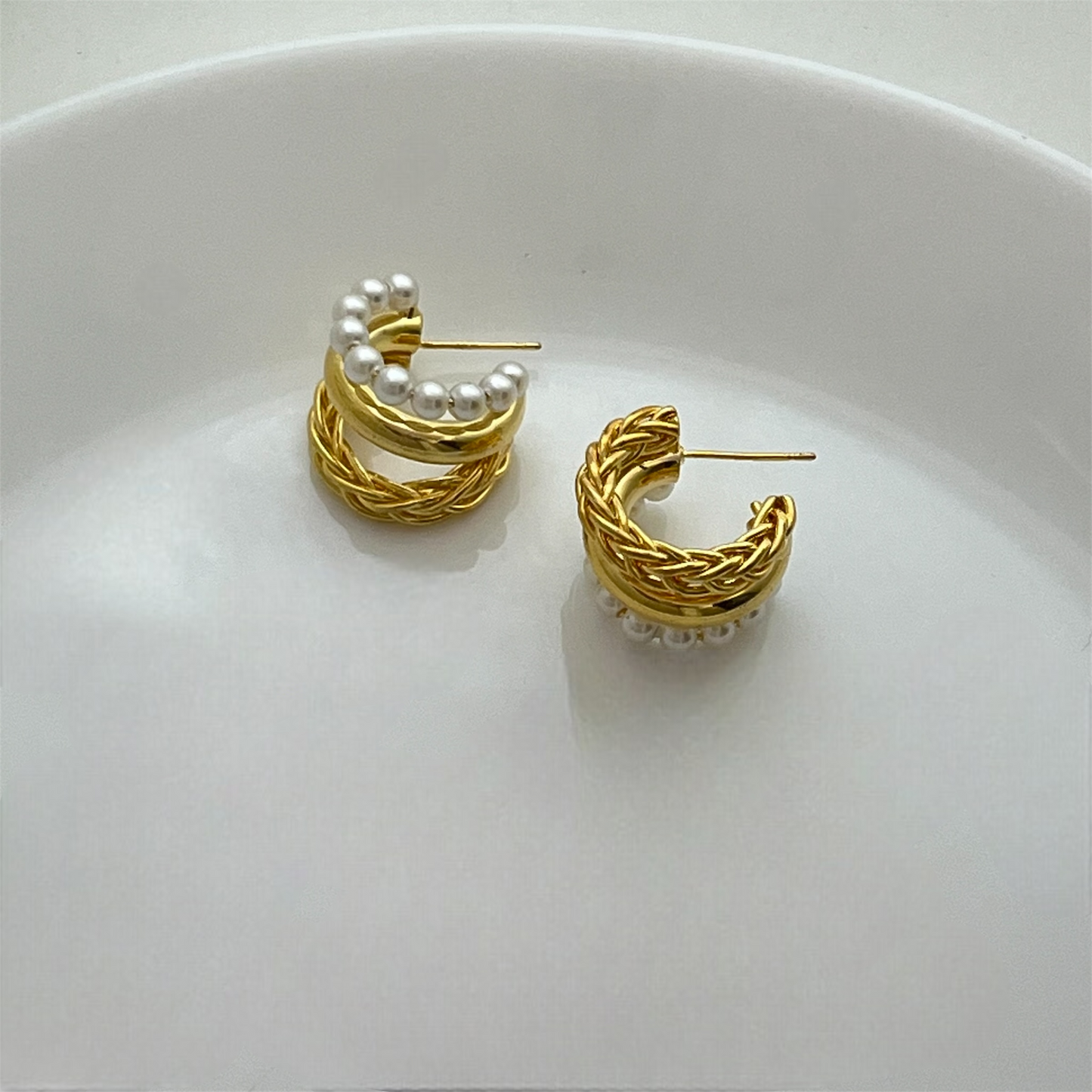 C-shaped pearl earrings